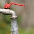 water flowing out of a tap